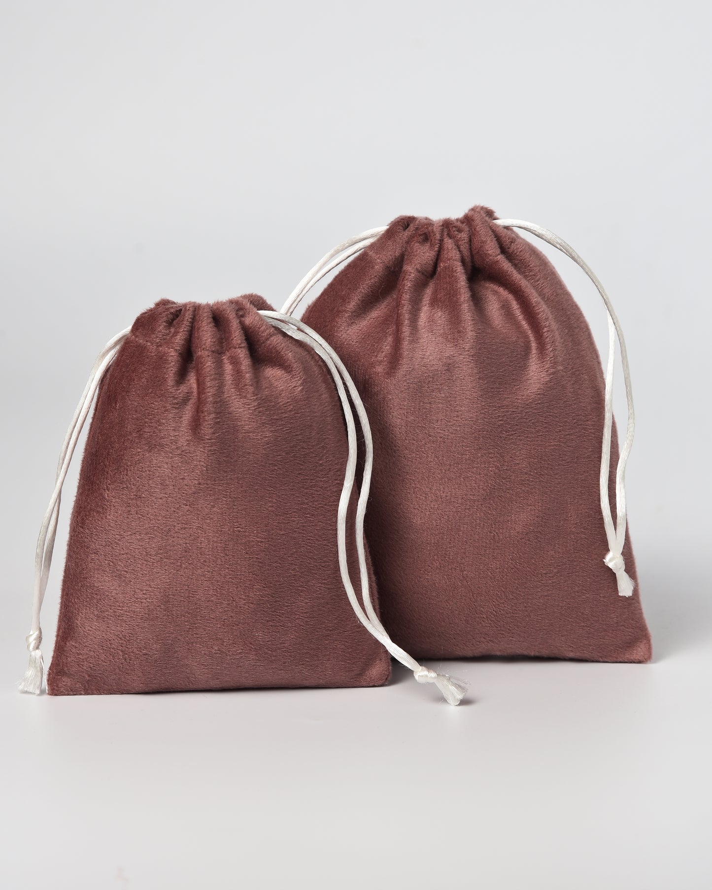 Onion Pink Velvet Drawstring Potli